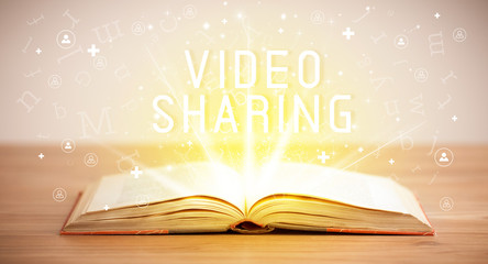 Open book with VIDEO SHARING inscription, social media concept