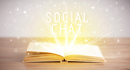 Open book with SOCIAL CHAT inscription, social media concept
