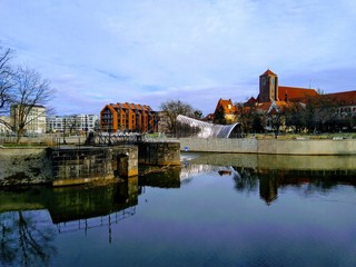 reflection of houses on the river