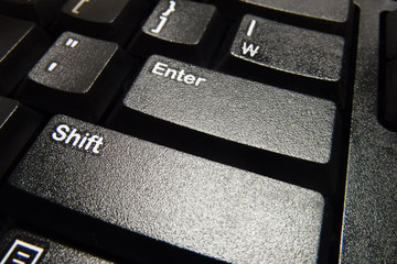 
Close-up concept of enter key and shift key on computer keyboard