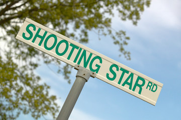 A road sign in AZ reads ÒShooting StarÓ