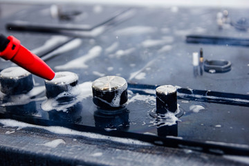 steam cleaner cleans the stove in the kitchen and disinfects the surface.