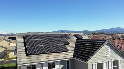 Aerial of a modern eco-friendly neighborhood in Tustin, California. 4k drone neighborhood