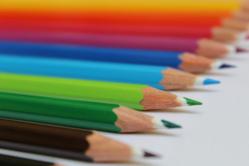 Colored pencils on a white background