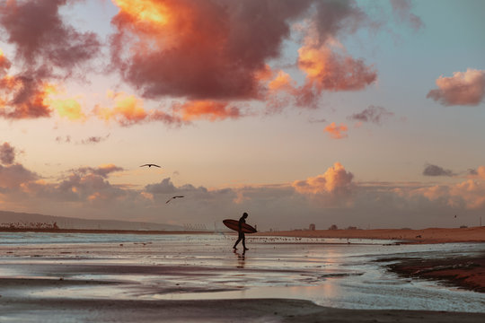 Solitary Surfer At Sunset
