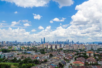 Fototapeta premium View of cumulus clouds over down town Kuala Lumpur, Malaysia.