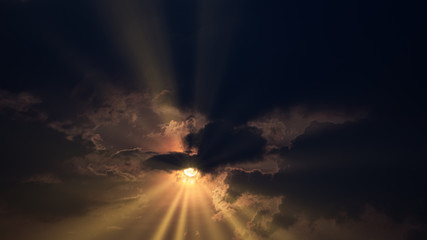 sun rays and clouds