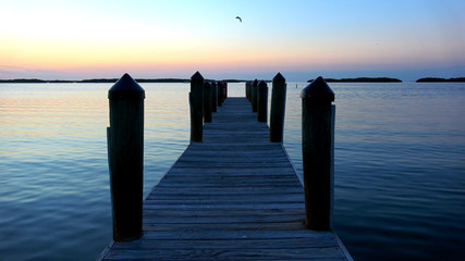 Beautiful pier in the evening at a calm sea