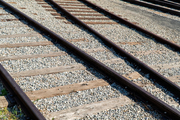 Close up of railroad tracks on sunny day