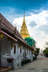 Ancient pagoda with church in Phra Kaew Don Tao temple