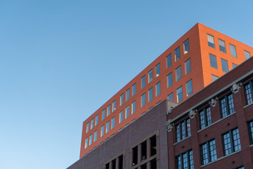 Orange building on clear sky background