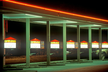 Burger drive up with neon lights at night