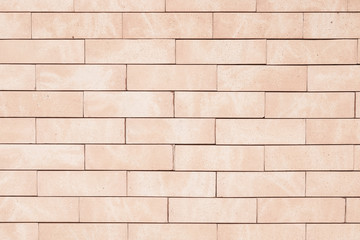 Light brown brick wall background