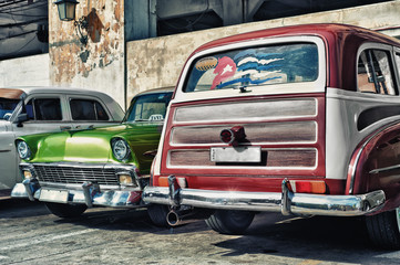 Old cars parked in a street of havana