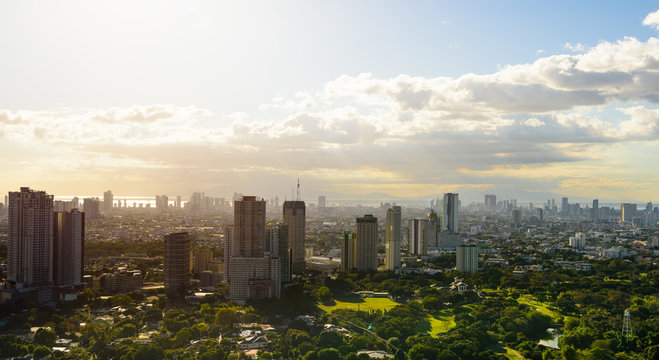 Makati skyline Manila, The Philippines at sunset.