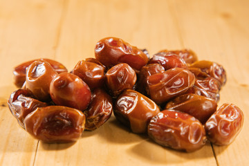date fruits on wooden table