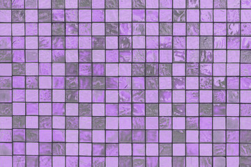 Purple color ceramic wall tiles abstract background.Mosaic texture for decoration of bathroom.Wallpaper textiles background.