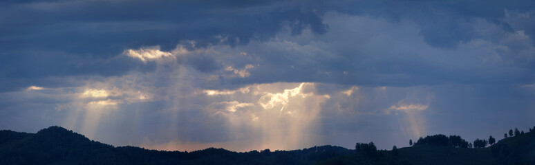 Panoramic view of the sunset sky, rainy cloud, natural backgrounds