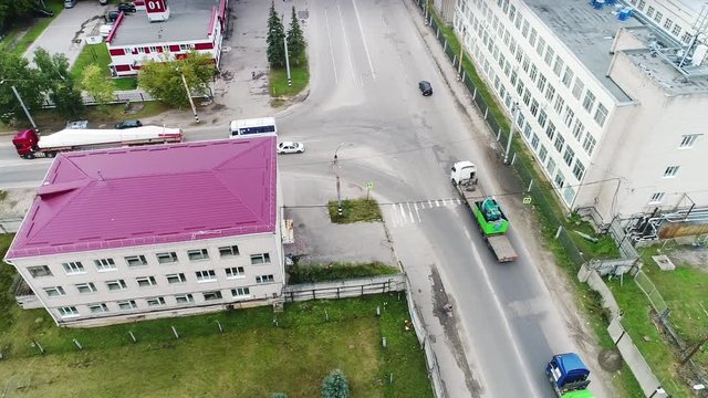 Spectacular view from unmanned quadrocopter, the movement of the column of trucks trucks, drive rotation, shipping wind generator, highway, road, top view, camera movement from left to right, the deve