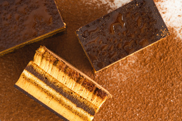 Chocolate cake with coffee mousse, biscuit, chocolate ganache and chocolate topping