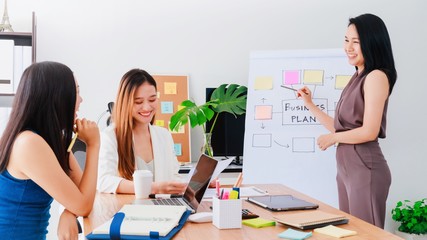Group of beautiful Asian women meeting in office to discussion or brainstorm business startup project.Concept of teamwork of empower woman.