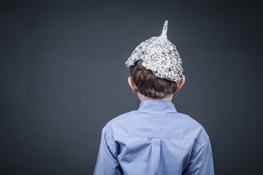 Boy in a tin foil hat back view