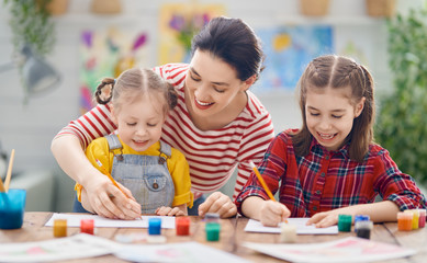 Happy family painting together.