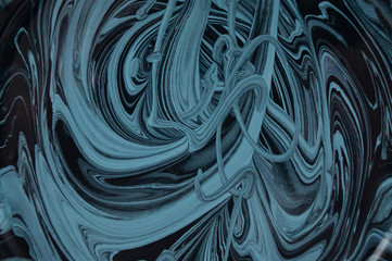 Abstract background mixing black and gray paint