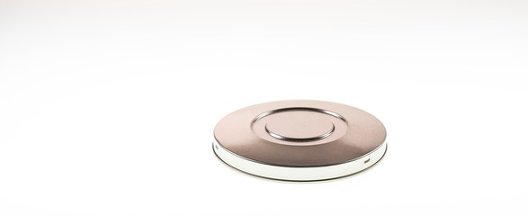 Metal disks isolated against a white background shot as an artistic backdrop.