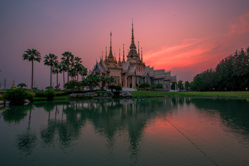 Wallpaper Wat Lan Boon Mahawihan Somdet Phra Buddhacharn(Wat Non Kum)is the beauty of the church that reflects the surface of the water,popular tourists come to make merit and take a public photo