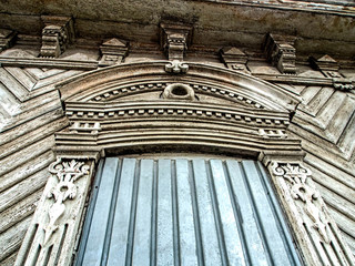 Carved wood trim Windows of the old house. House with carved wooden architraves, Russia, southern...