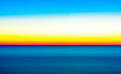 Artistic shot of sunset shot with long exposure and intentional movement photo technique. 