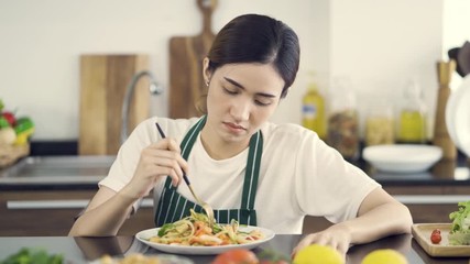 Portrait o f young attractive woman feeling sad and bored with diet not wanting to eat vegetables or healthy food in Dieting Eating Disorders and weight loss concept.4K Solution.