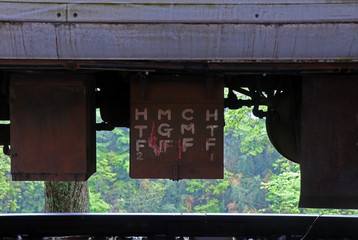 words under train