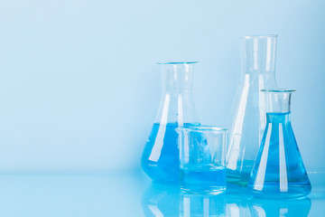 research studies on the search for vaccines, laboratory glassware, equipment, tests.