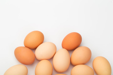 a lot of chicken eggs on a white background