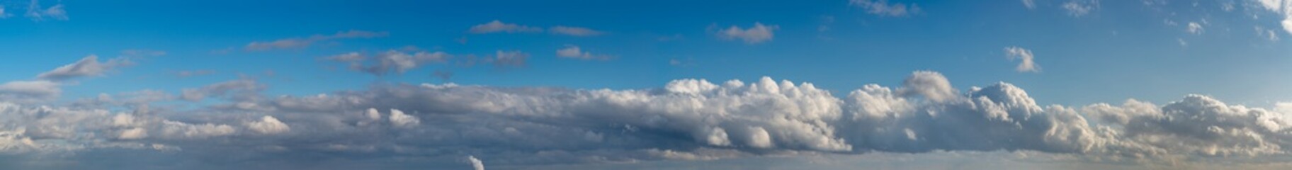 Obraz premium Fantastic clouds against blue sky, panorama