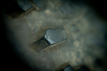 Blurred with a strong increase in the photo of the surface of the dirty tire