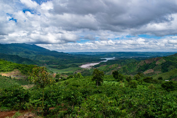 Fototapeta na wymiar landscape with mountains and clouds bao loc asia vietnam