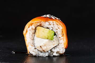 sushi on the black background
