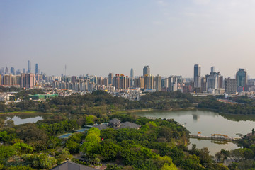 Fototapeta na wymiar Luhu Park and Guangzhou city skyline, Guangzhou, China
