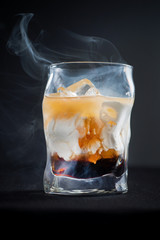 creative cocktail on the dark background