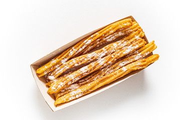 churros with sugar powder in the box
