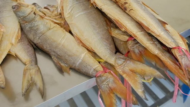 Traditional process of making salted dried threadfin fish, local premium product of Pattani.