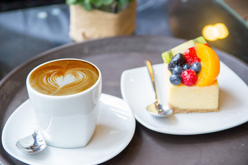 top view cappuccino coffee on table cloths backgeound