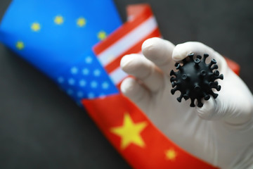 Worldwide pneumonia pandemic. The virus from China. Coronovirus molecule printed model on a 3D...