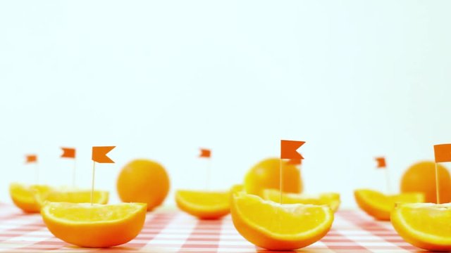 The concept of healthy food. Orange, vitamin C. boat in the form of an orange. Marine theme in food