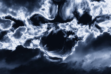 Naklejka na ściany i meble creepy scary face of black thunderclouds in a thunderous sky