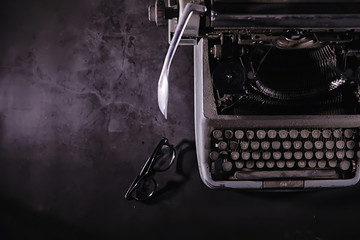 Vintage journalist tool. Typewriter retro. The writer is at work. Seal of the novel. Journalist...