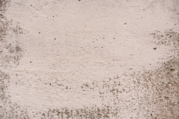 Texture of a concrete wall with cracks and scratches which can be used as a background